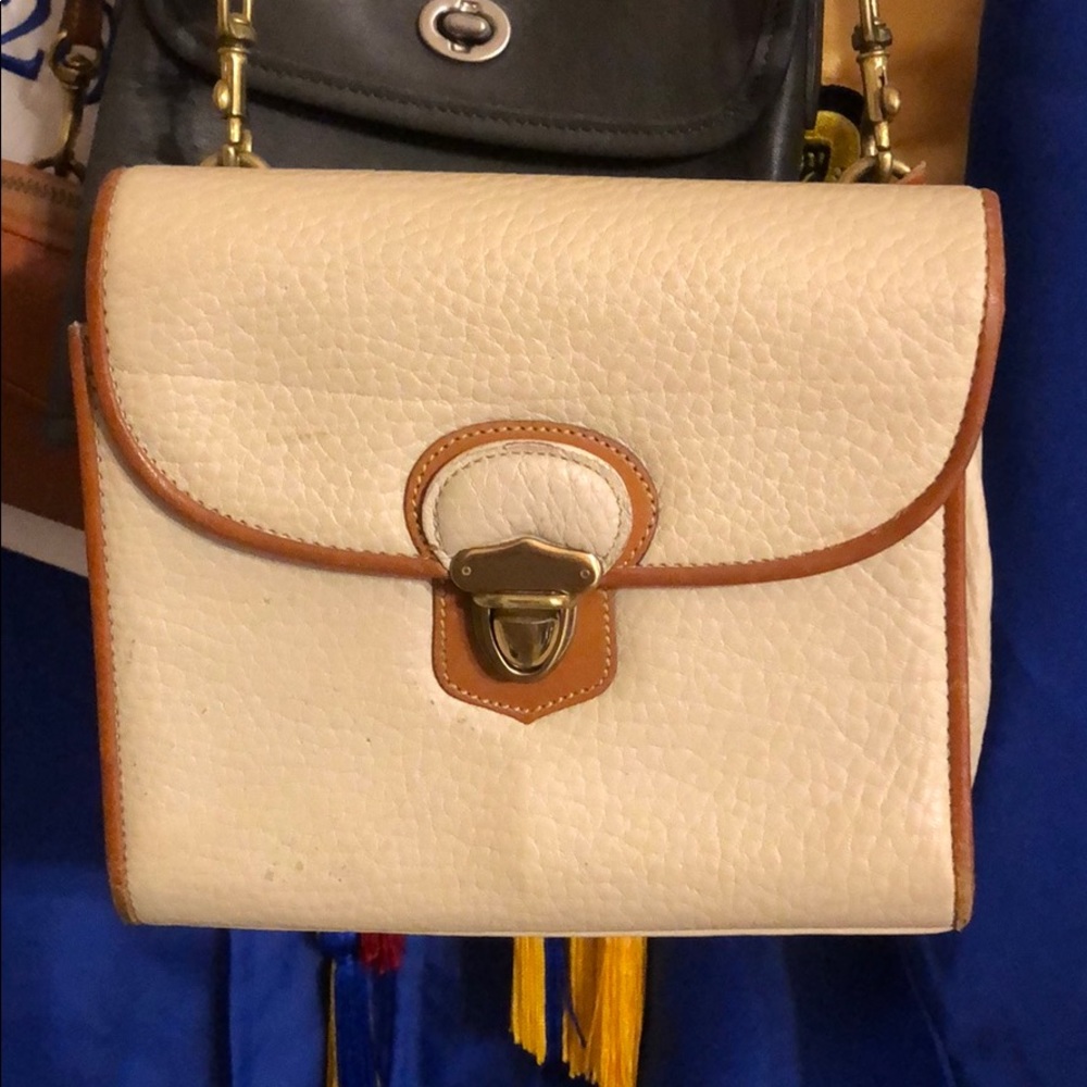 Dooney & Bourke purse. Some marks. Used condition